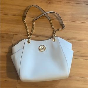 White, like-new Michael Kors purse. Inside clean.